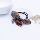 SIMPLE PEARL BOW HAIR TIE_CWAHA1074