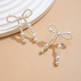BOW FRENCH TASSEL PEARL EARRINGS_CWAJE1156