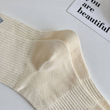 STRIPED COLOR BLOCK LETTERING SPORTS SOCKS_CWMS0964