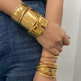 BOLD GOLD OPEN CUFF BRACELET IN STAINLESS STEEL_CWAJE4623