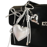 ELEGANT SILVER HEART BOW BAG KEYCHAIN_CWMM7640