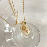DECEMBER THREE DIMENSIONAL FLORAL OVAL NECKLACE_CWAJE1614