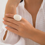 EXAGGERATED FRENCH DISC PLEATED METAL RING_CWAJE1824