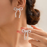 BOW FRENCH TASSEL PEARL EARRINGS_CWAJE1156