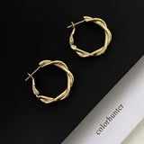 SIMPLE GEOMETRIC LARGE CIRCLE SPIRAL EARRINGS_CWAJE3137