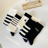 SIMPLE BLACK AND WHITE STRIPED SOCKS_CWMS0976