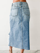 Trendy asymmetrical ripped denim skirt