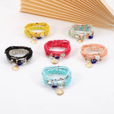 BOHEMIAN MULTI LAYERED EVIL EYE BRACELET_CWAJE2214