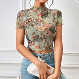 FLORAL PRINT MESH TOP WITH RUFFLE DETAILING_CWTBLS1510