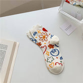 MILKY WHITE DOODLE SMILEY PATTERN CREW SOCKS_CWMS0208