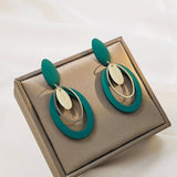 SIMPLE GEOMETRIC OVAL HOLLOW EARRINGS_CWAJE1867