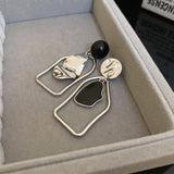 FOLDED GEOMETRIC ASYMMETRIC EARRINGS_CWAJE2067