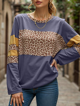 Leopard-print asymmetrical hem long-sleeve top