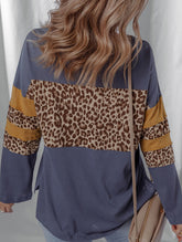 Leopard-print asymmetrical hem long-sleeve top