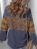 Leopard-print asymmetrical hem long-sleeve top