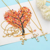 DIAMOND STUDDED PEARL CROSS PENDANT NECKLACE_CWAJE0899