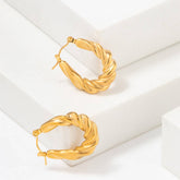 GOLD STAINLESS STEEL TWISTED U SHAPED EARRINGS_CWMM3652