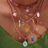 FABRIC SUN MOON NECKLACE WITH PINK CRYSTAL CHARM_CWMM7539