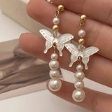 NEW NATURAL MOTHER OF PEARL BUTTERFLY EARRINGS_CWAJE3114