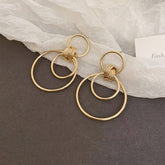 MINIMALIST GLOSSY CIRCULAR COMMUTING EARRINGS_CWAJE2049