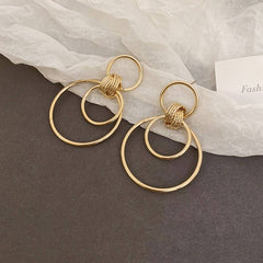MINIMALIST GLOSSY CIRCULAR COMMUTING EARRINGS_CWAJE2049