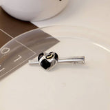 BLACK GLAZE FLOWER HEART CHECKERBOARD HAIRPIN_CWAHA4737