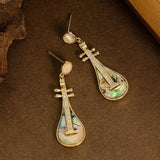 DIAMOND ENCRUSTED ABALONE PIPA PENDANT EARRINGS_CWMM4286
