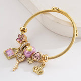 ADJUSTABLE GOLD BRACELET WITH CROWN KEY HEART_CWMM8565