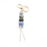 LEOPARD WOOD BEAD KEYCHAIN WITH MINI TASSEL_CWMM7022