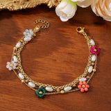 CRYSTAL PETALS 18K GOLD PLATED BRACELET_CWMM3728