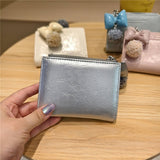 Textured Bow Pendant Bifold Wallet_Cwab06235