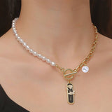 FAUX PEARL CHARM PENDANT NECKLACE_CWAJE0438