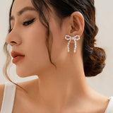BOW FRENCH TASSEL PEARL EARRINGS_CWAJE1156