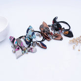 SIMPLE PEARL BOW HAIR TIE_CWAHA1074