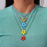 COLORFUL GLASS FLOWER PENDANT ROPE NECKLACE_CWMM7527