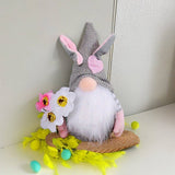 EASTER BUNNY GNOME HOLDING A BOUQUET OF FLOWERS_CWMM3481