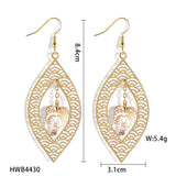 HOLLOW YELLOW SHELL LEAF CARVED EARRINGS_CWMM4366