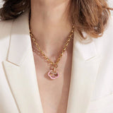 CRYSTAL HEART LOCKET NECKLACE WITH SUN FLOWERS_CWMM6952