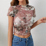 FLORAL PRINT MESH TOP WITH RUFFLE DETAILING_CWTBLS1510