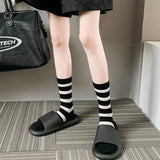 BLACK AND WHITE STRIPED HEART EMBROIDERED SOCKS_CWMS0997