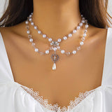 PEARL BEADED NECKLACE WITH PENDANT_CWAJE1157