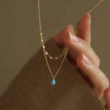 BLUE TEARDROP GLITTER DOUBLE LAYER NECKLACE_CWAJE1579