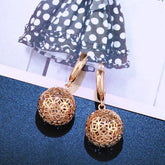 HOLLOW ROUND EARRINGS_CWAJE0999