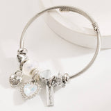 STAINLESS STEEL BEADED BRACELET WITH HEART CHARM_CWMM8508