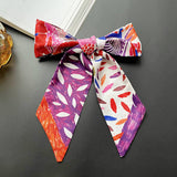 Narrow Decorative Silk Scarf With Tieable Bow_Cwasc0741