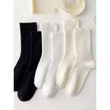 SOLID COLOR BONELESS SOCKS STACKED MID TUBE SOCKS_CWMS1116