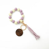 LEOPARD WOOD BEAD BRACELET WITH TASSEL KEYCHAIN_CWAB5013