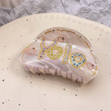 HAIR CLAW CLIP WITH YOLO LETTERS AND RHINESTONES_CWASC1604