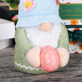 EASTER EARS BUNNY HOLDING EGG DWARF DOLL_CWMM3477