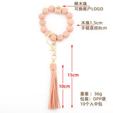LEOPARD WOOD BEAD BRACELET KEYCHAIN WITH TASSEL_CWMM7016